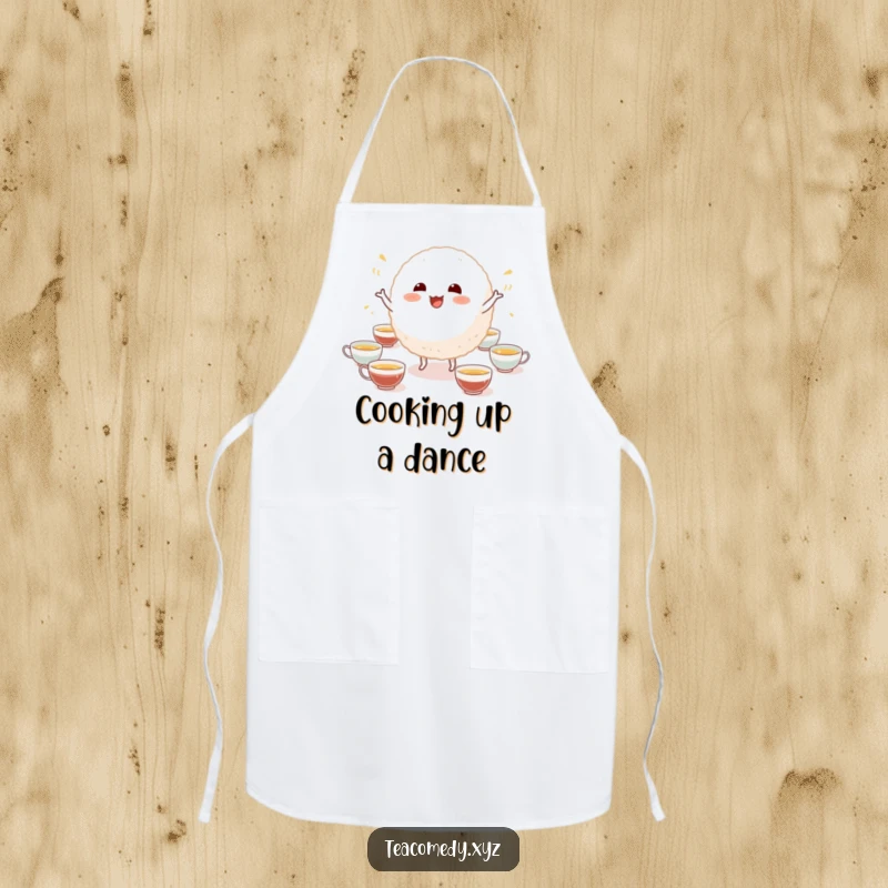 Funny apron displaying a cheerful rice ball character dancing joyfully surrounded by tiny teacups, ideal for kitchen humor.