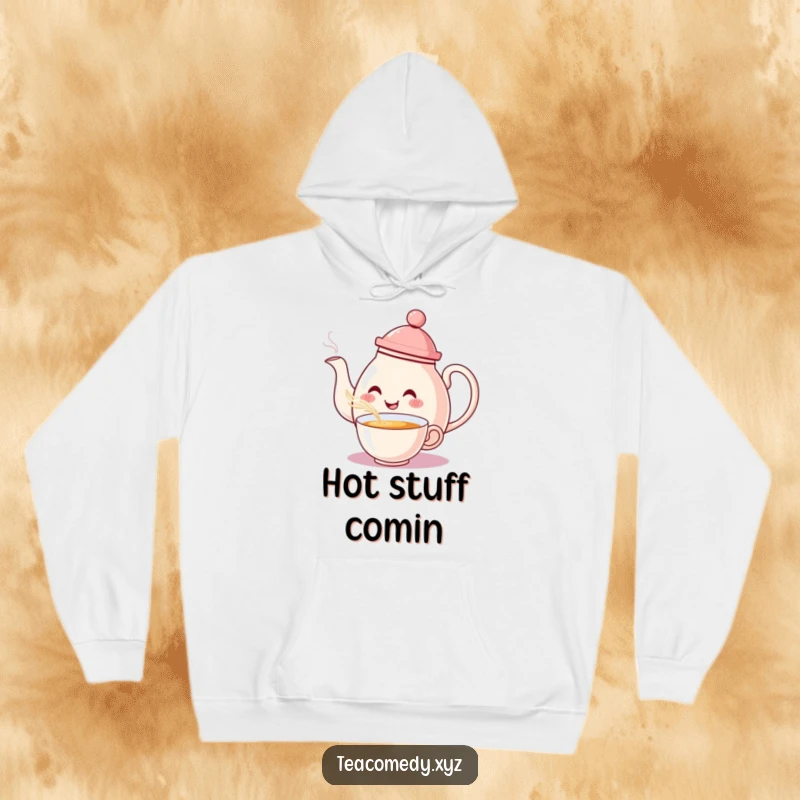 Funny Teapot Hoodie: A smiling, hat-wearing teapot pouring tea with a flourish, offering cozy comfort.